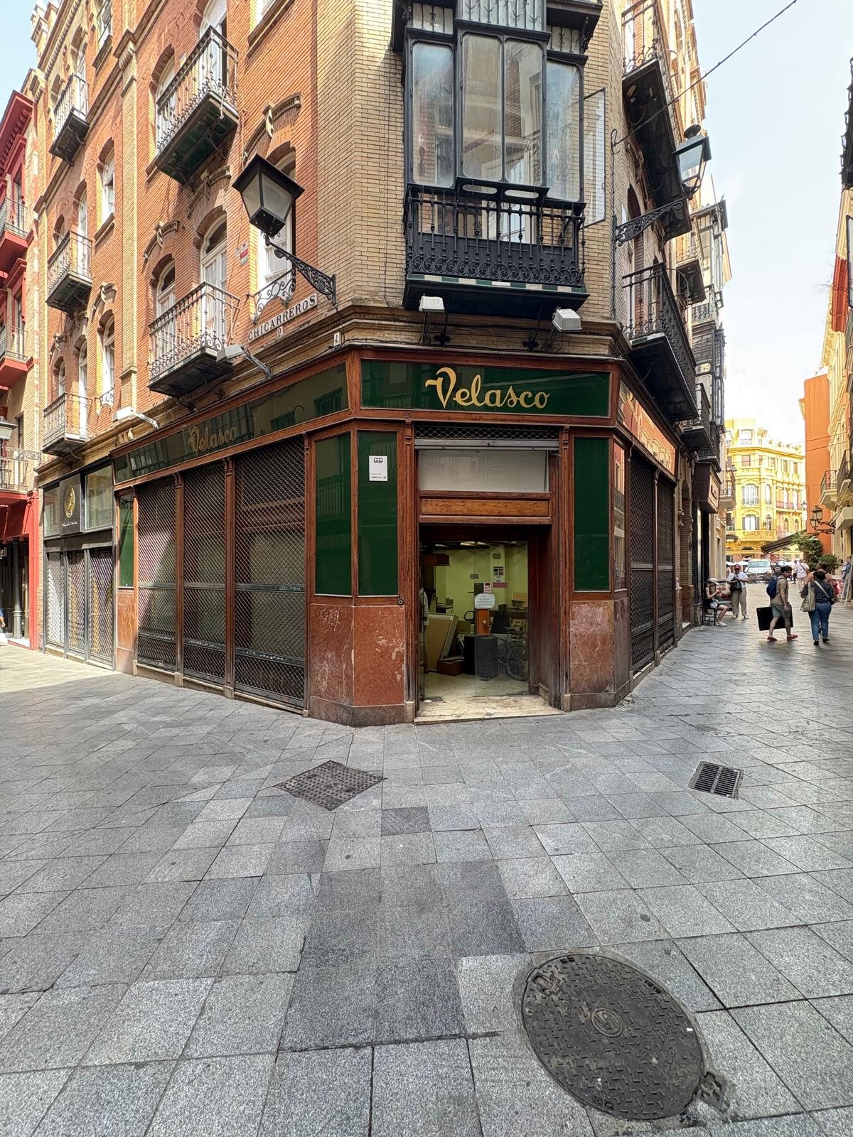 The shop, on a corner in central Seville, before the works